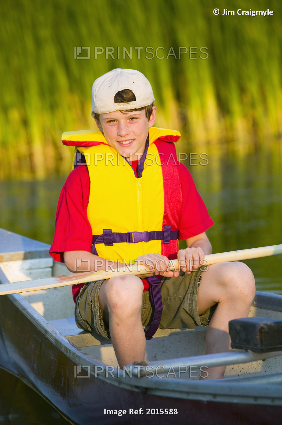 Boy In Canoe