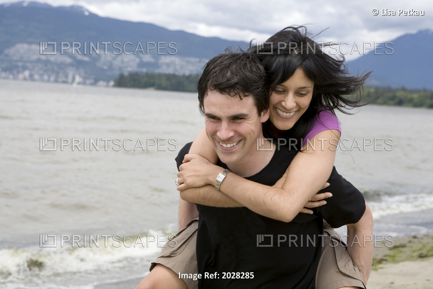 Couple On Kitsilano Beach With Downtown Vancouver In Background, British ...