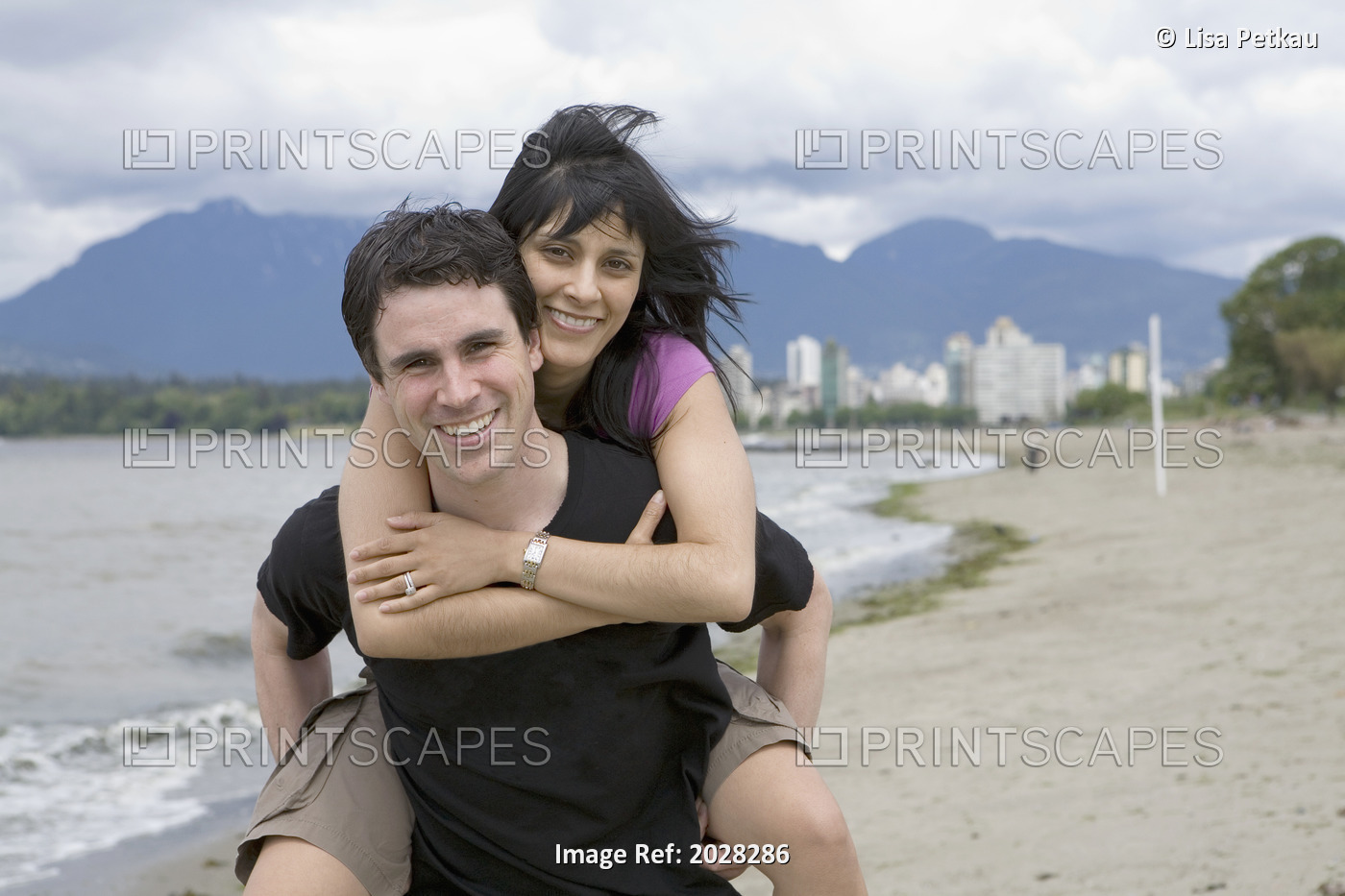 Couple On Kitsilano Beach With Downtown Vancouver In Background, British ...