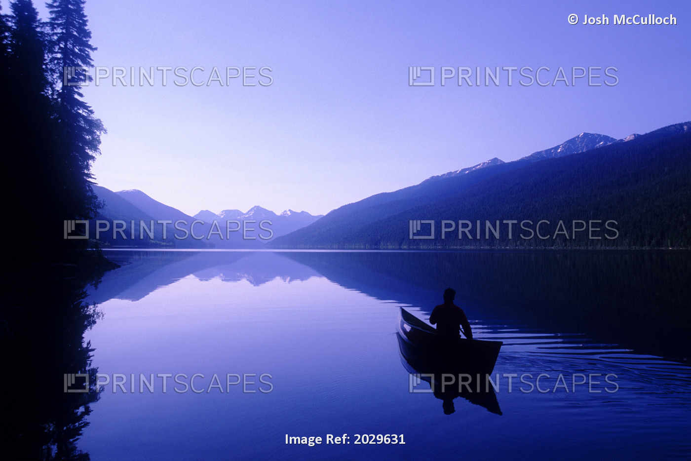 Silhouette Of A Canoeist At Sunrise, Isaac Lake, Bowron Lake Provincial Park, Bc