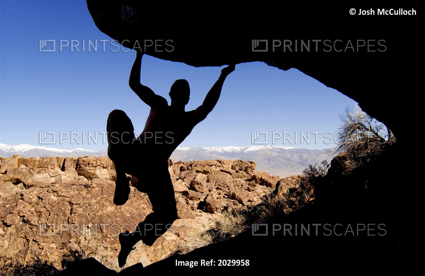 Silhouette Of A Rock Climber