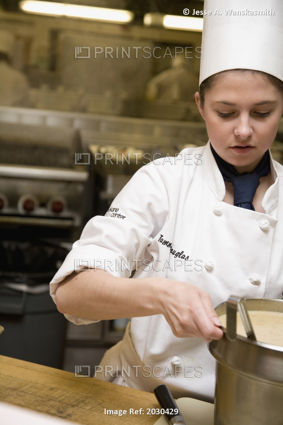 Model Preparing A Sauce In A Professional Kitchen, Spokane, Washington