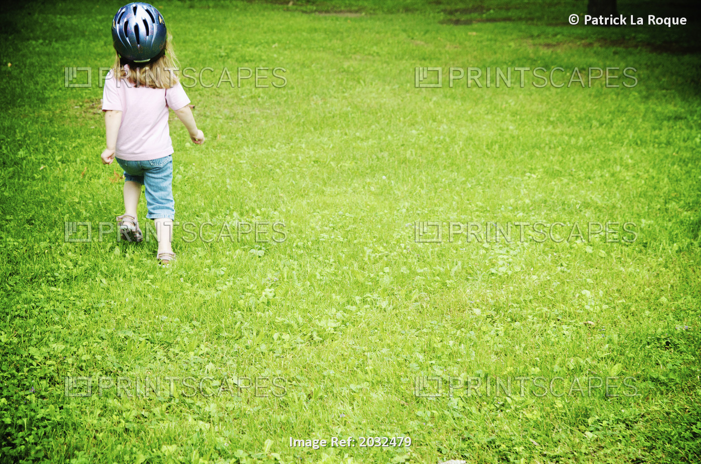 Blond Girl With Bike Helmet Running In Park, Otterburn Park, Quebec