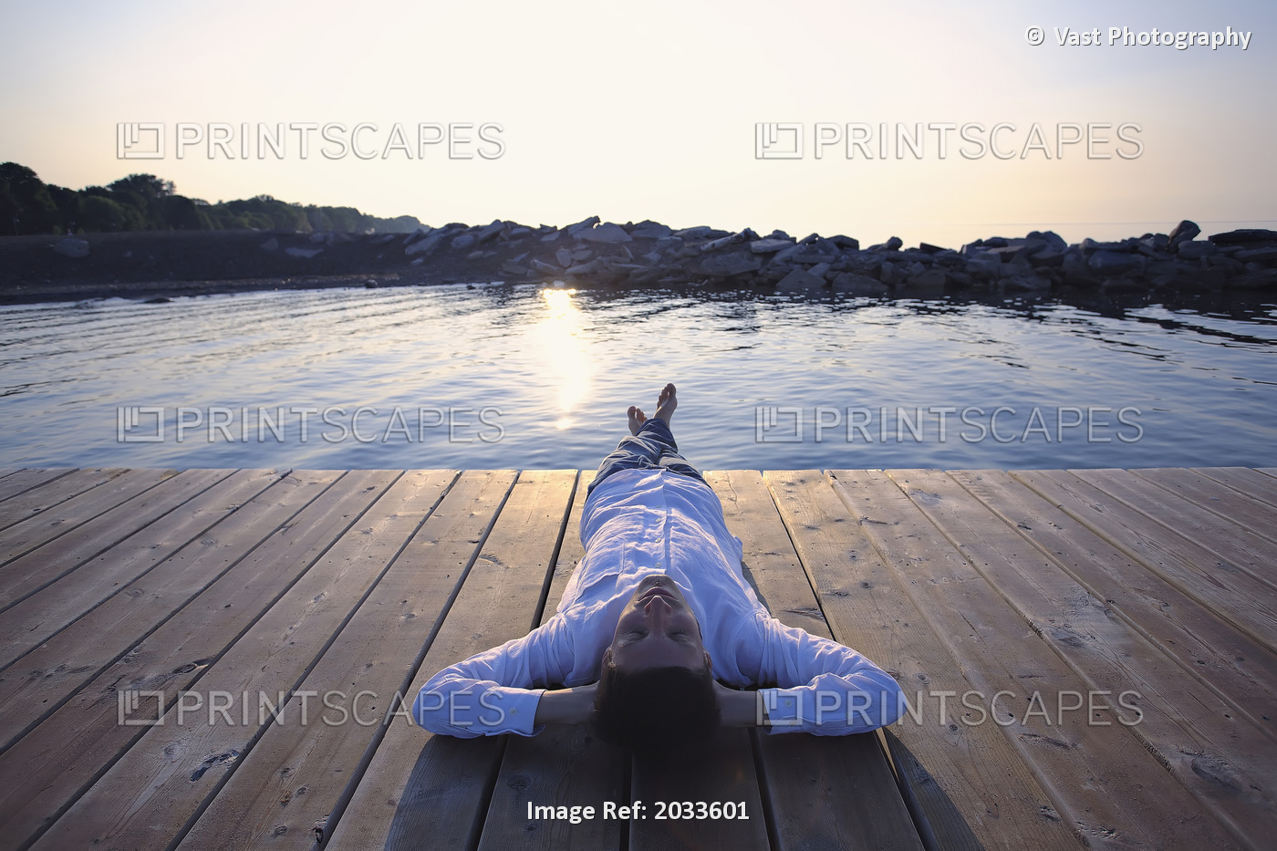 Man On Dock On Lake Ontario At Sunrise, Woodbine Beach, Toronto, Ontario