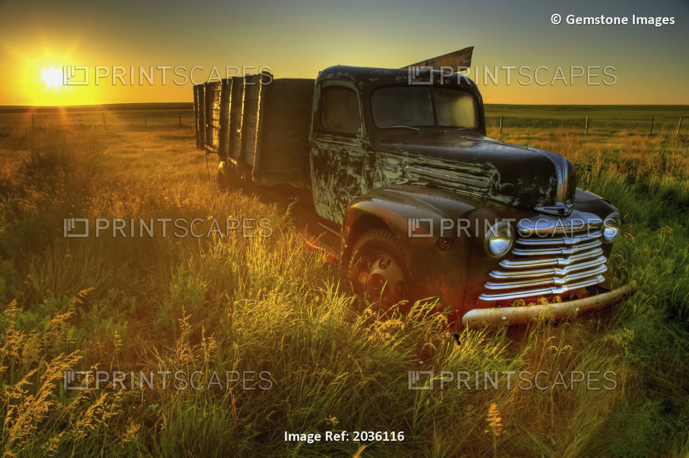 Old Abandoned Farm Truck Illuminated At Sunrise, Southwestern Saskatchewan