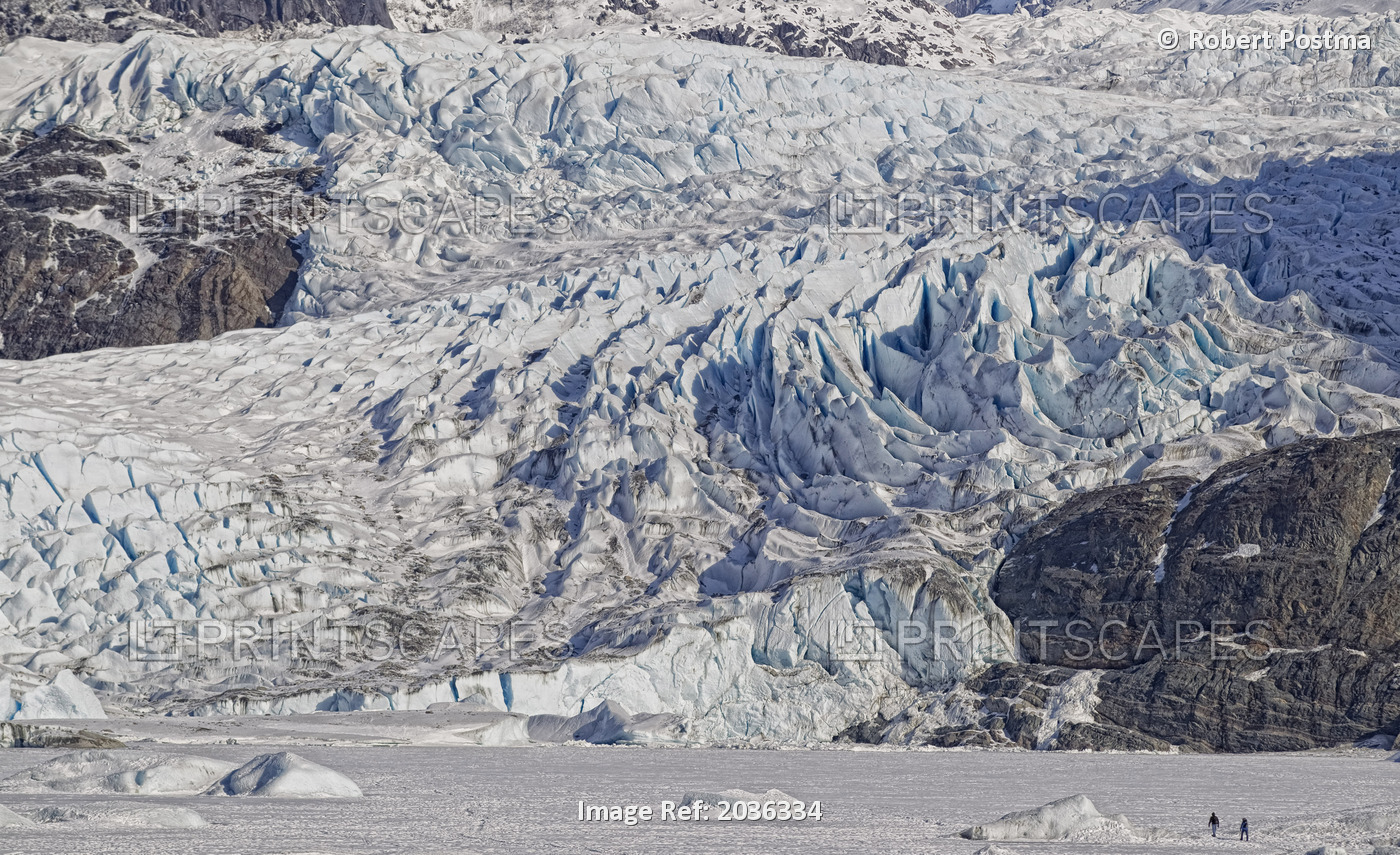 People Walking To The Base Of The Mendenhall Glacier, Juneau, Alaska.