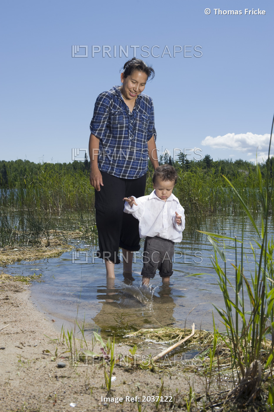 Native American Mother With Her Son Standing In The Shallow Water Of The Shoal ...