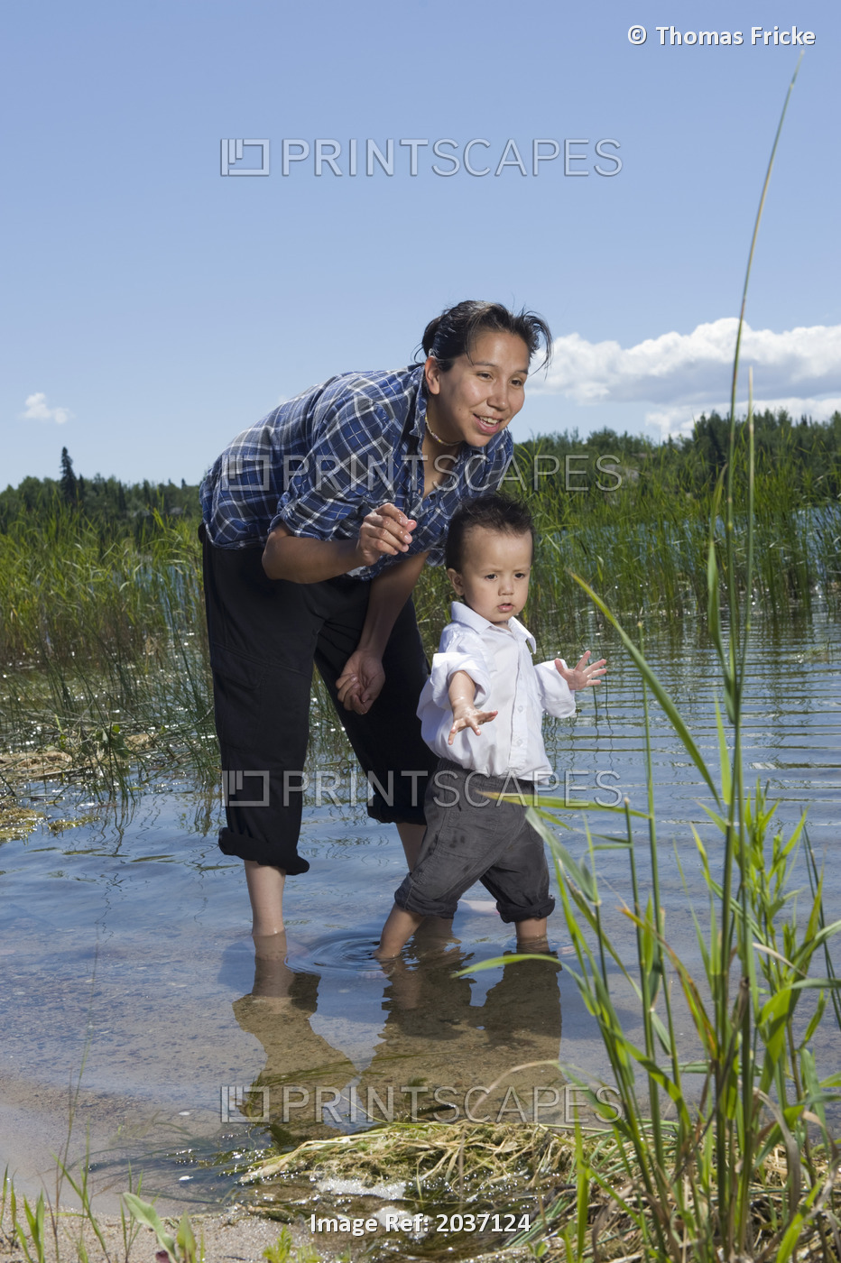 Native American Mother With Her Son Standing In The Shallow Water Of The Shoal ...