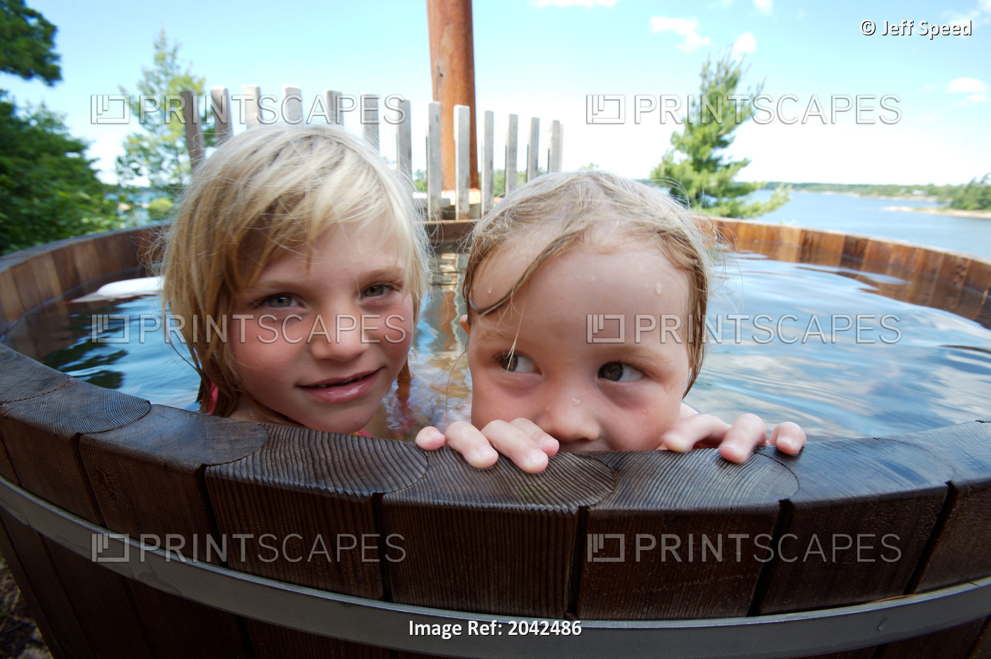 Little Girls In A Hot Tub At A Cottage, Muskoka, Ontario