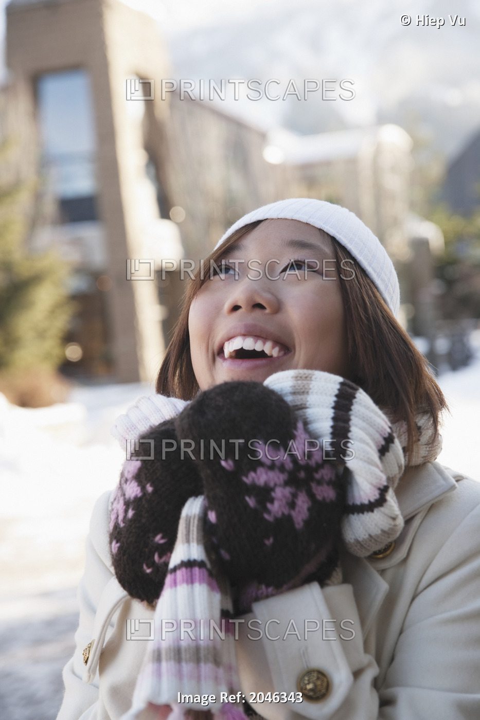 Portrait Of Smiling Woman In Toque, Scarf And Mitts, Whistler Village, ...