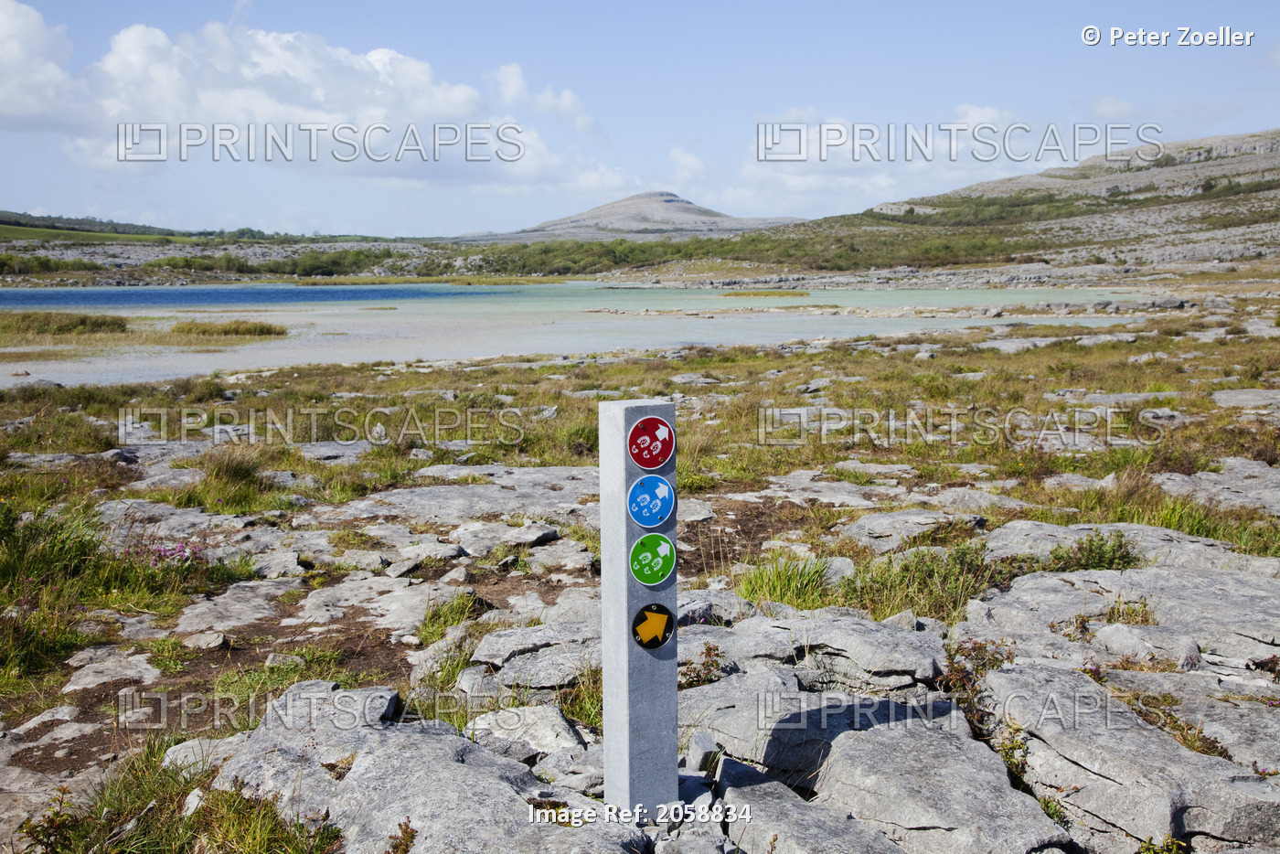 A Sign Post With Signs For Various Walking Paths In The Burren; County Clare, ...