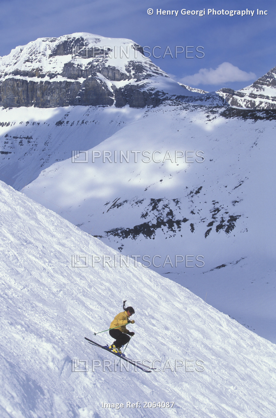 Young Woman Skiing In The Bumps At Lake Louise Resort, Alberta, Canada.
