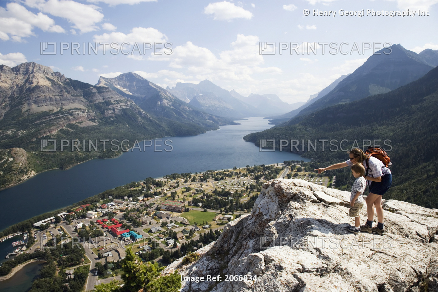 Mother And Child Enjoy View At Waterton Lakes National Park, Alberta Canada