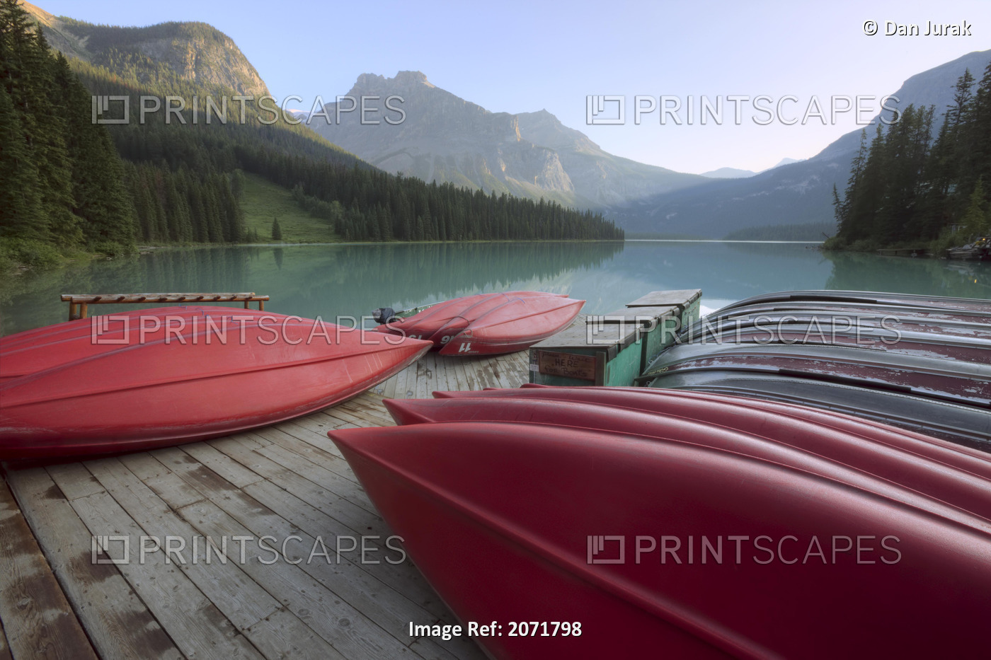 Red Canoes On A Dock, Emerald Lake, Yoho National Park, British Columbia