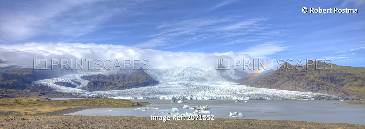 A Rainbow Over The Glacier Down The Mountain Off Of The Vatnajorkull Ice Cap, ...