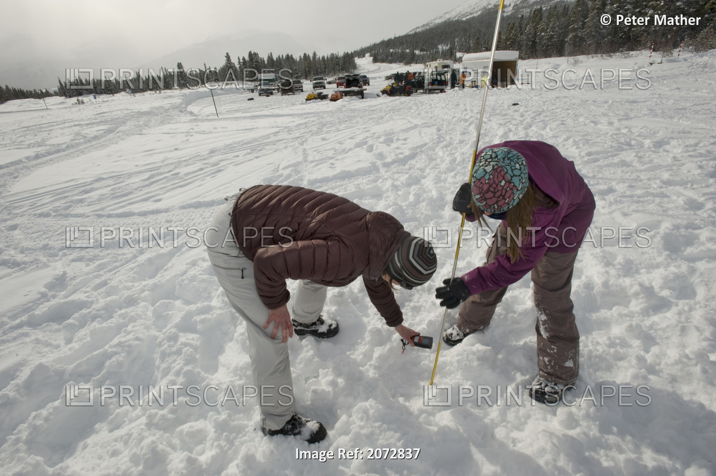 Woman And Girl Practicing Avalanche Search With A Beacon, Avalanche Safety ...