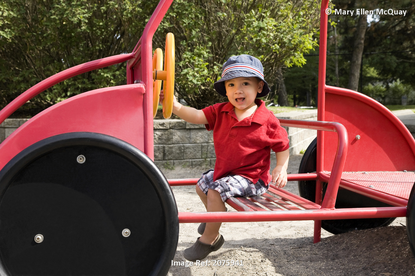 Young Asian-Caucasian Boy Driving A Toy Truck; Ontario Canada