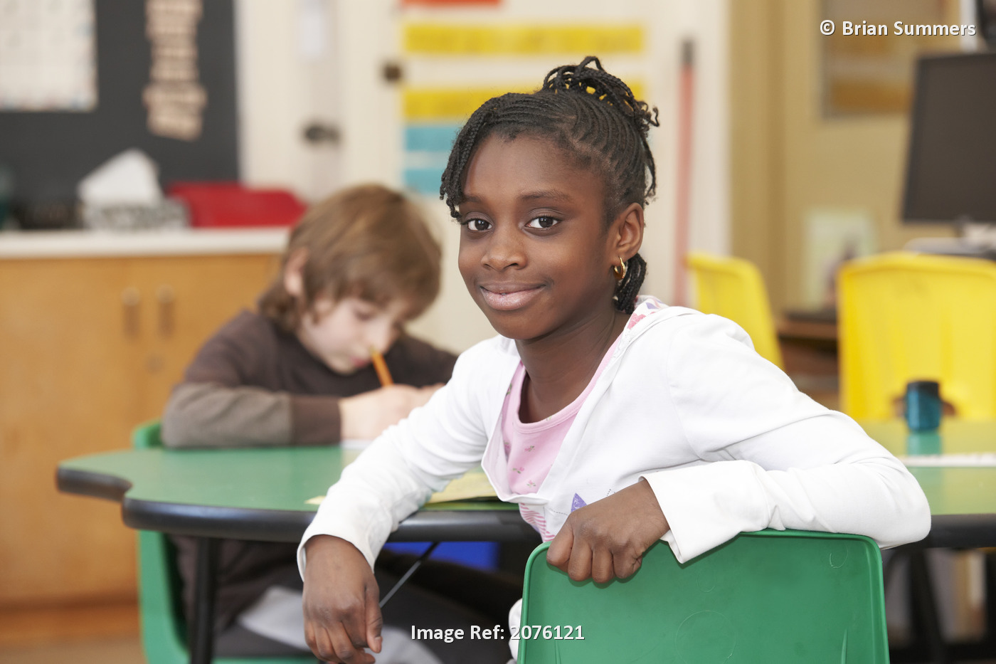 Young Grade 3 Girl Happy And Smiling In The Classroom; Toronto Ontario Canada