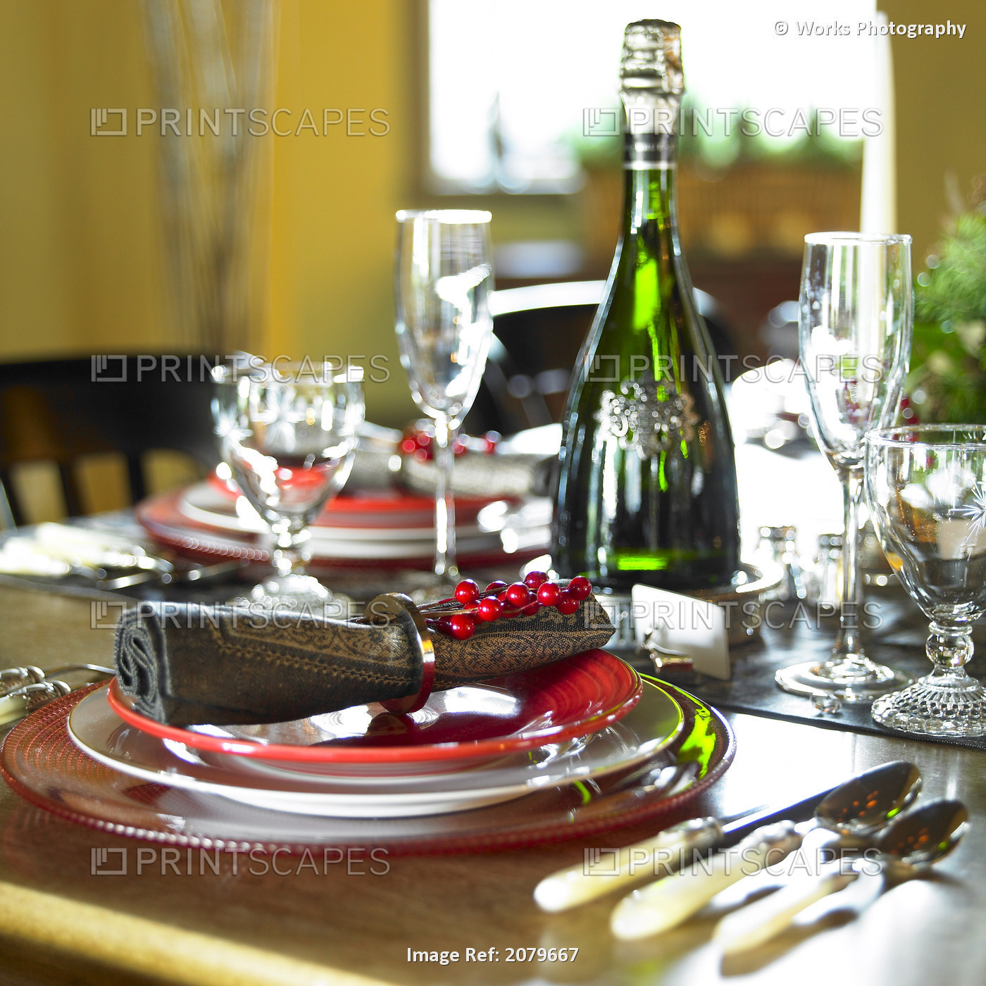 Table Setting With Red And White Plates, Red Berries On Napkin Ring And ...