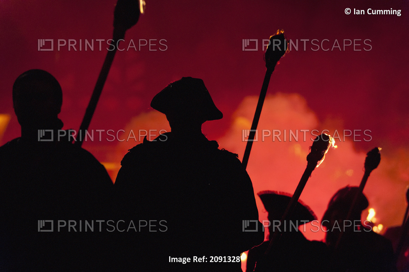 Silhouettes Of Pirates With Burning Torches Lit By Red Flare Walking Through ...
