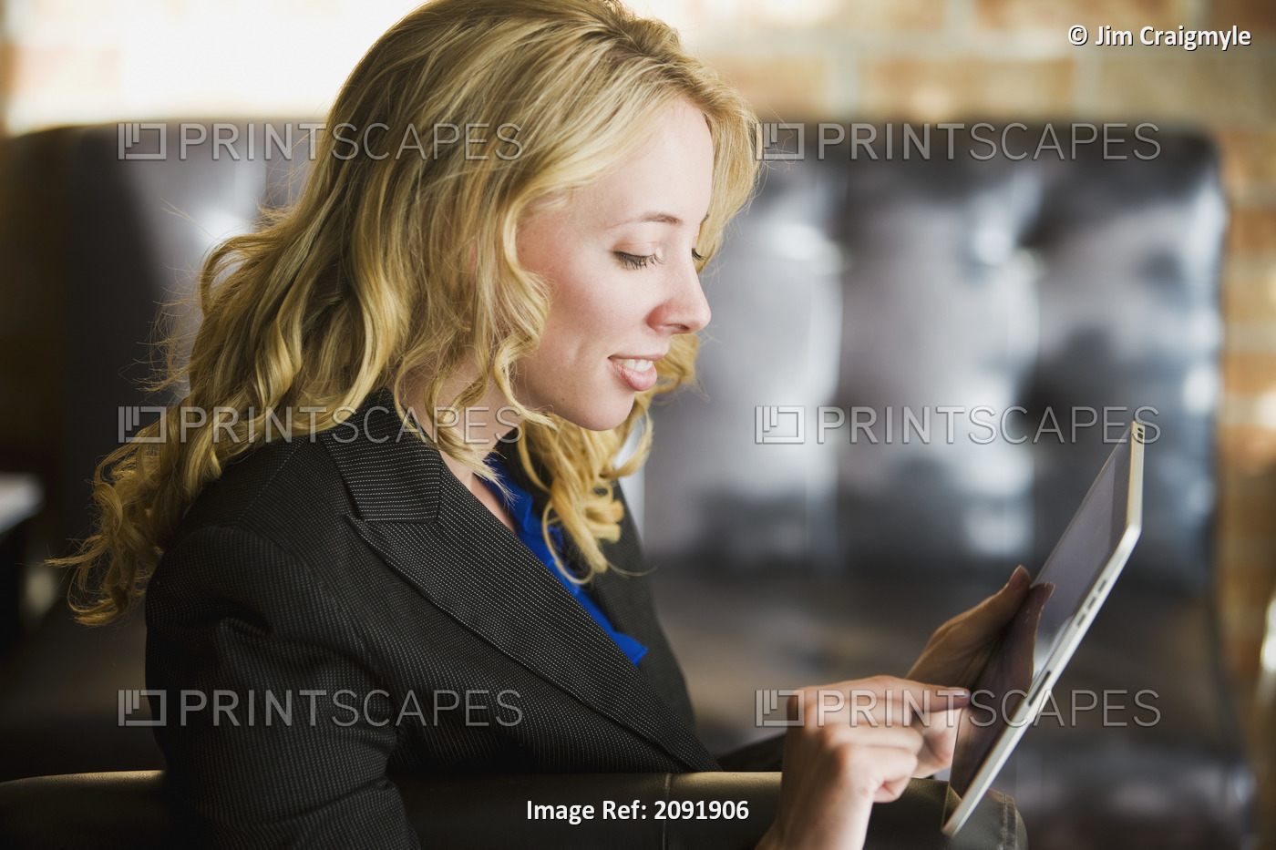 Young Businesswoman Using A Tablet; Bradford Ontario Canada
