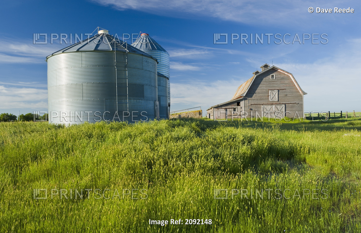 Old Barn With Metal Grain Bins; Ponteix Saskatchewan Canada