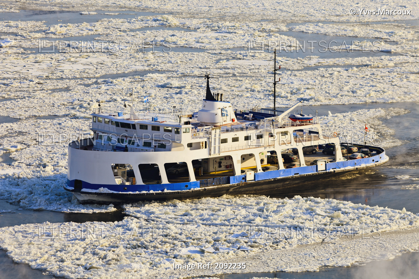 Ferry Moving Through Ice On The Saint Lawrence River; Quebec Canada