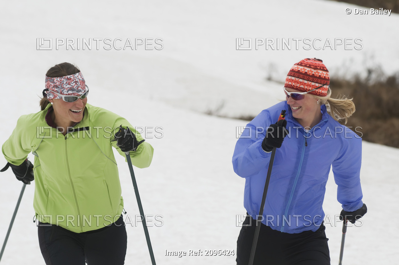 Two Young Women Cross Country Skiing Together At Glen Alps Area In Chugach ...