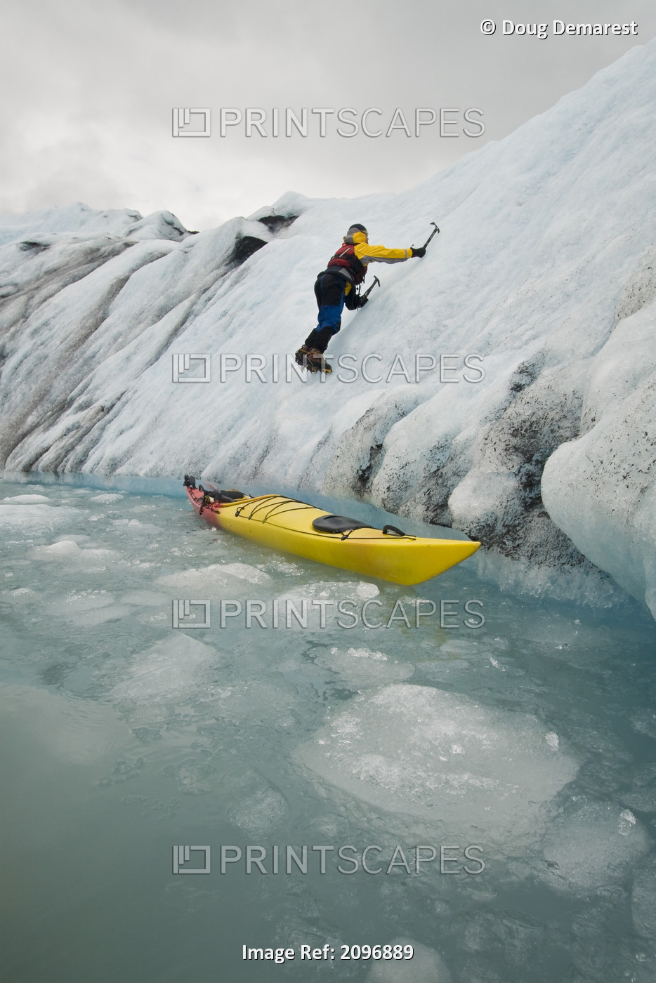 Man Uses Ice Axe To Exit Sea Kayak Onto Bear Glacier In Kenai Fjords National ...