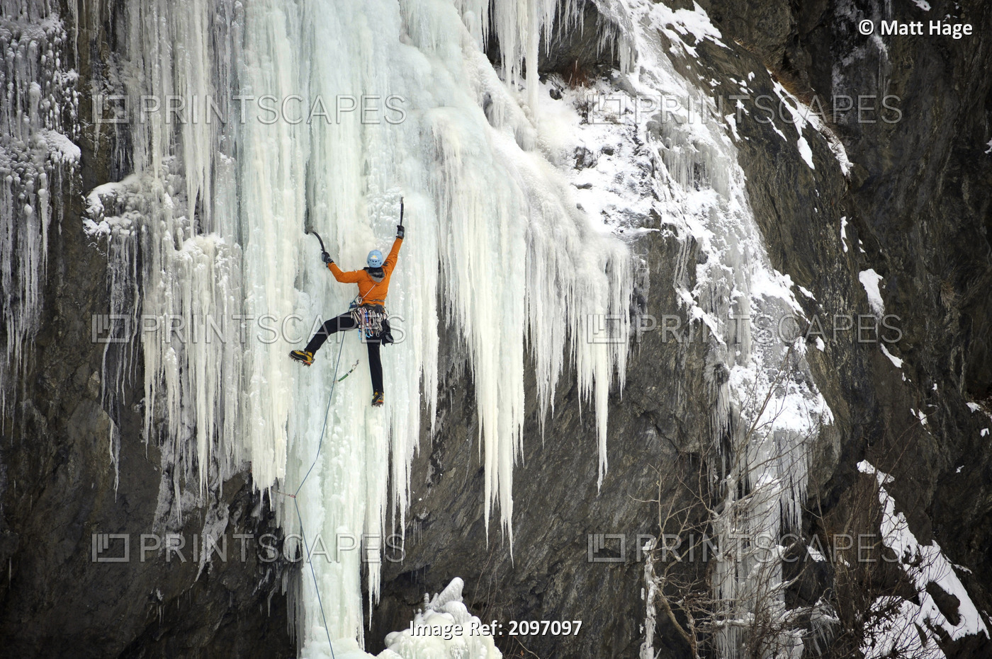 Ice Climber Ascends A Large Icefall In Southcentral Alaska