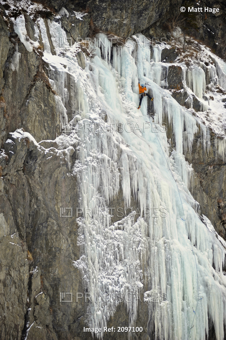Ice Climbers Ascends A Large Icefall In Southcentral Alaska