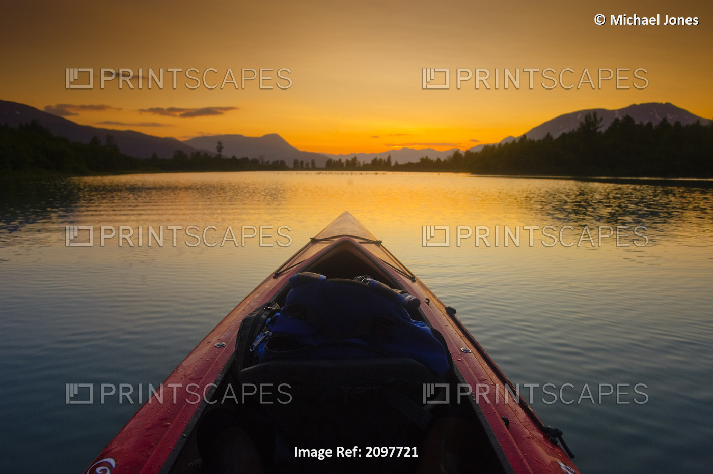 A Kayaker's Perspective While Crossing A Calm Lake At Sunset, Southcentral ...