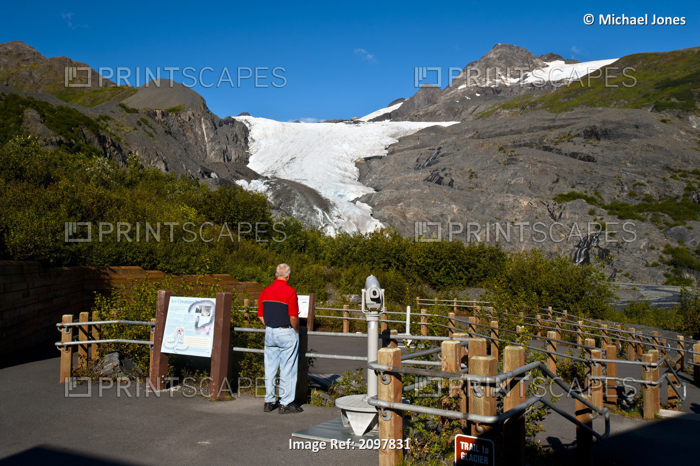 A Male Tourist Reads A Interpretive Sign On The Glacier Trail At Worthington ...