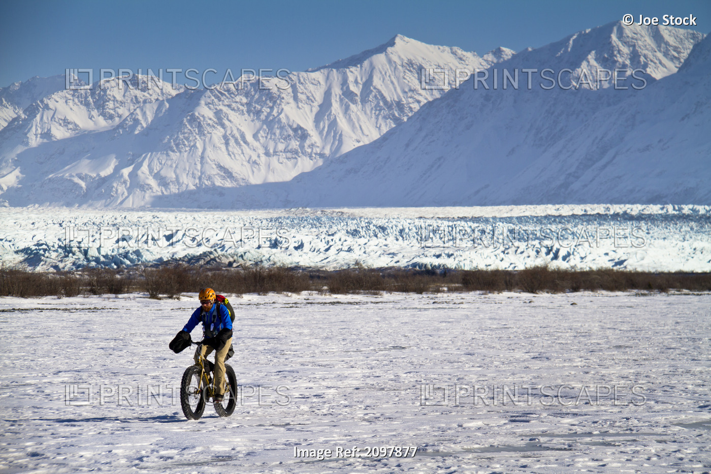 Man Fat Tire Mountain Biking On The Knik Glacier, Chugach Mountains, ...