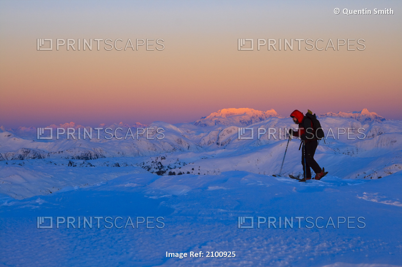 Skier Crosses Windy Top Of Wrangell Peak As The Last Light From The Evening Sun ...