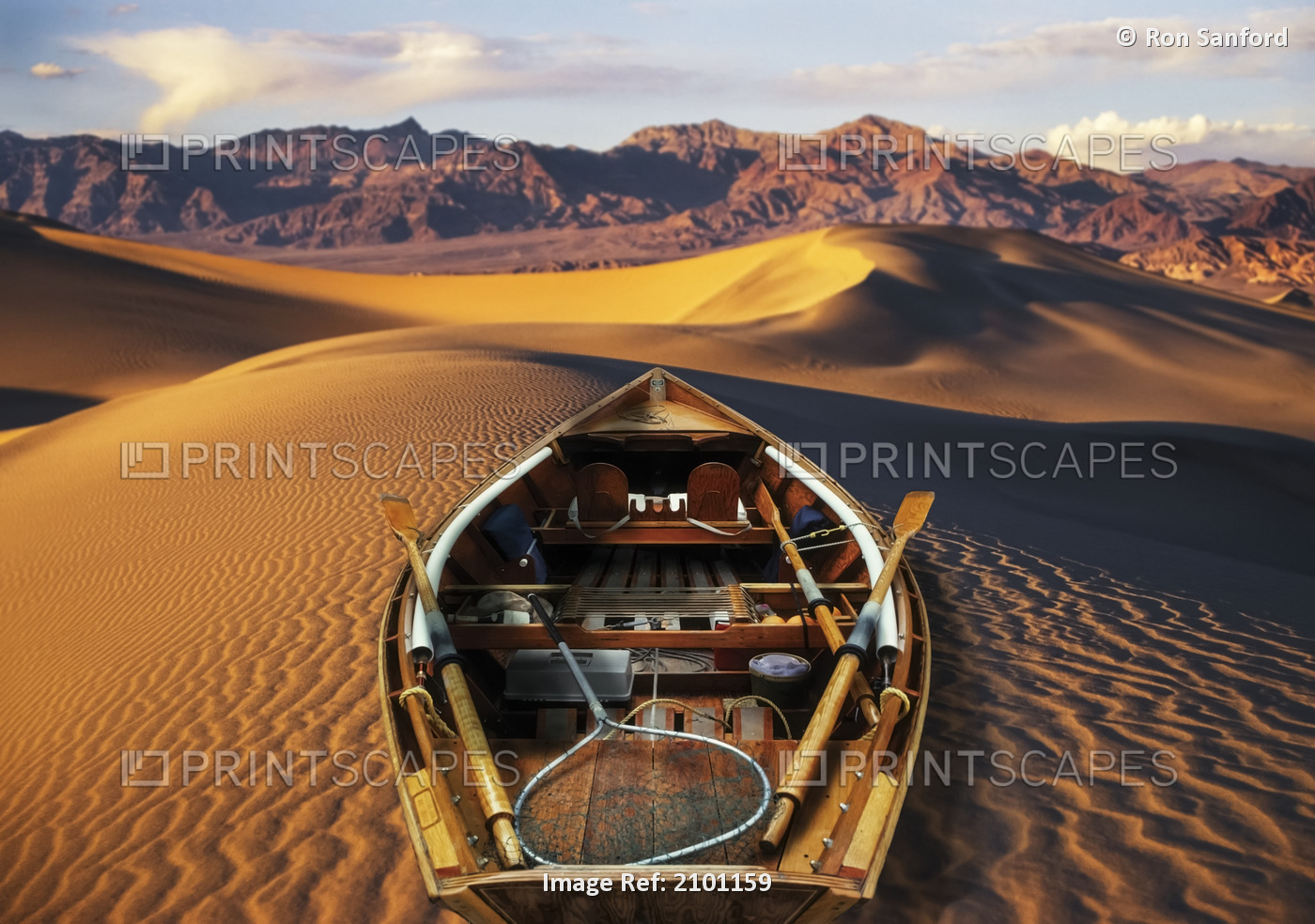 Drift Boat Resting On Sand Dunes In Death Valley National Park Representing ...