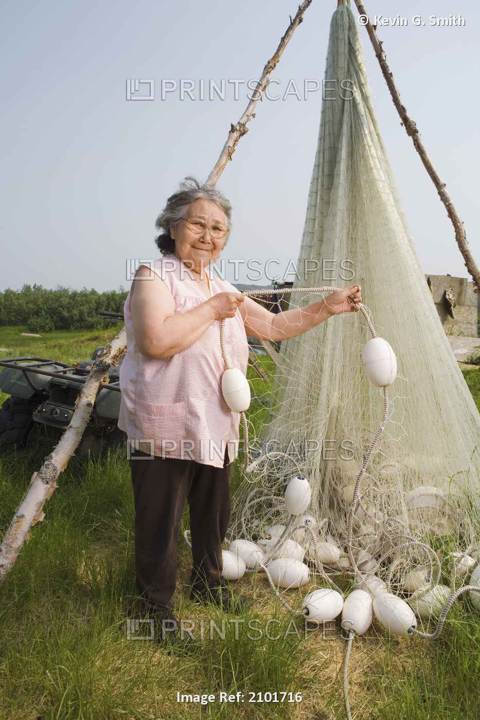 Elder Native Yupik Woman Stands Next To Drift Net She Made For Daughter ...
