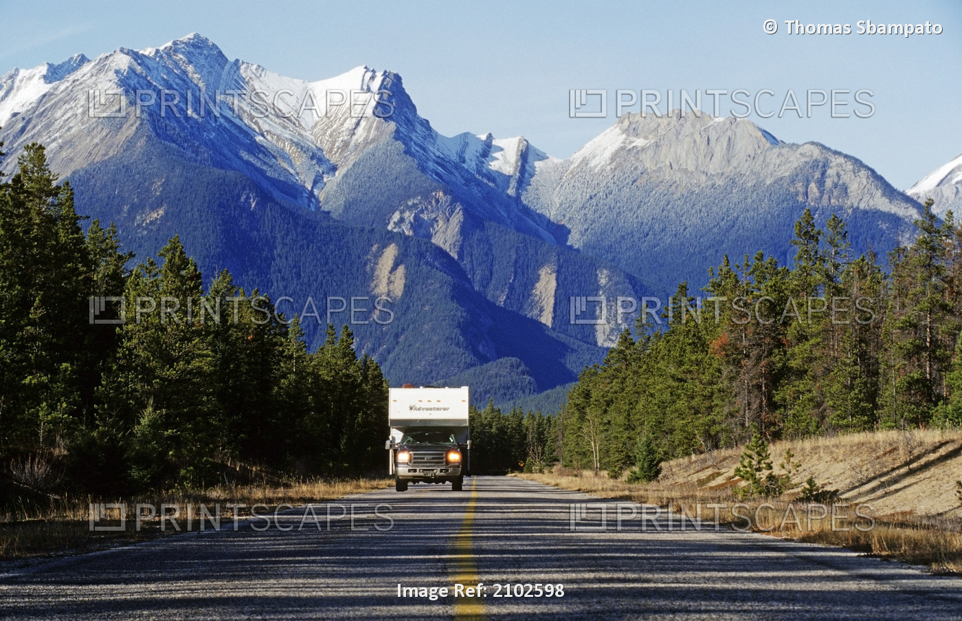 Pickup Truck With Camper Driving Along Highway Through Jasper National Park ...