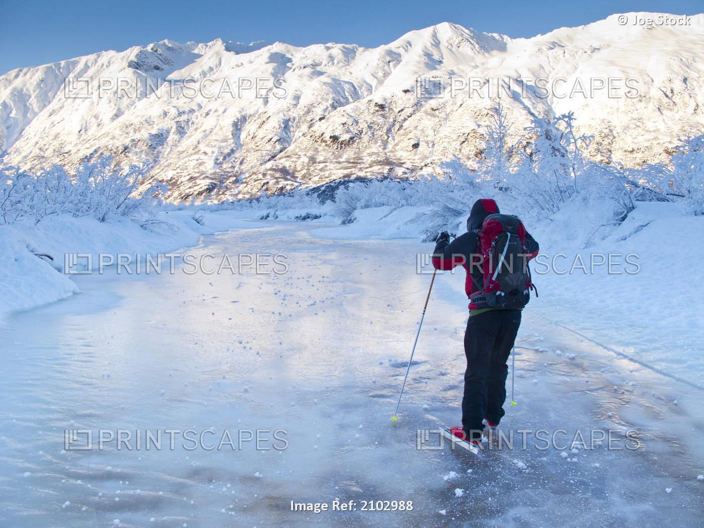 Man Nordic Ice Skating On The Frozen Placer River, Kenai Mountains, ...