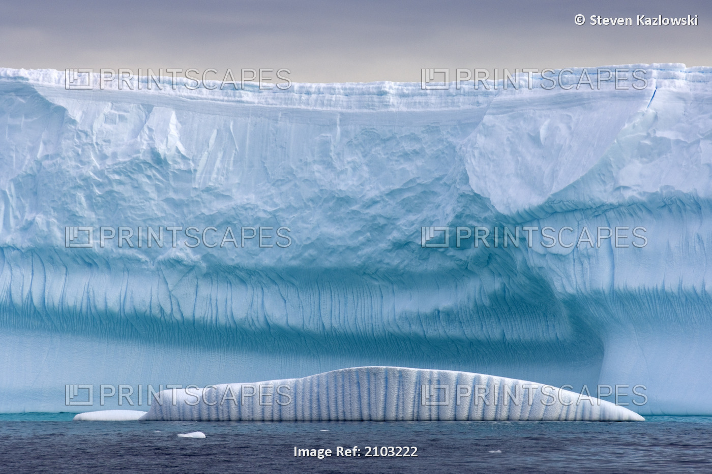 Iceberg Floating In Front Of A Tidewater Glacier Off The Western Antarctic ...
