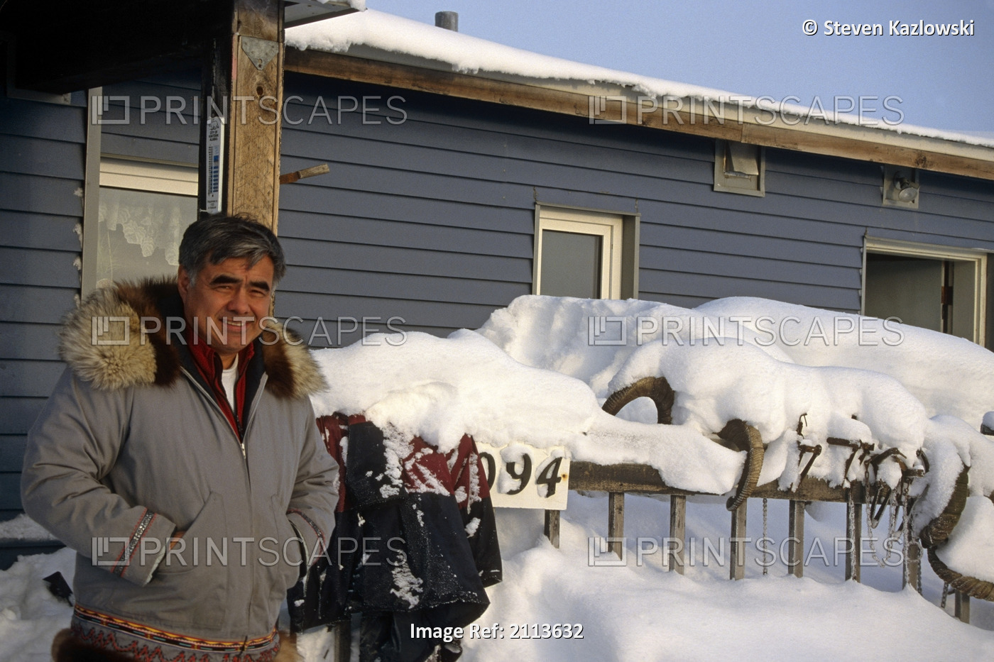 Portrait Of Native Alaskan Man In Front Of Home Kaktovik