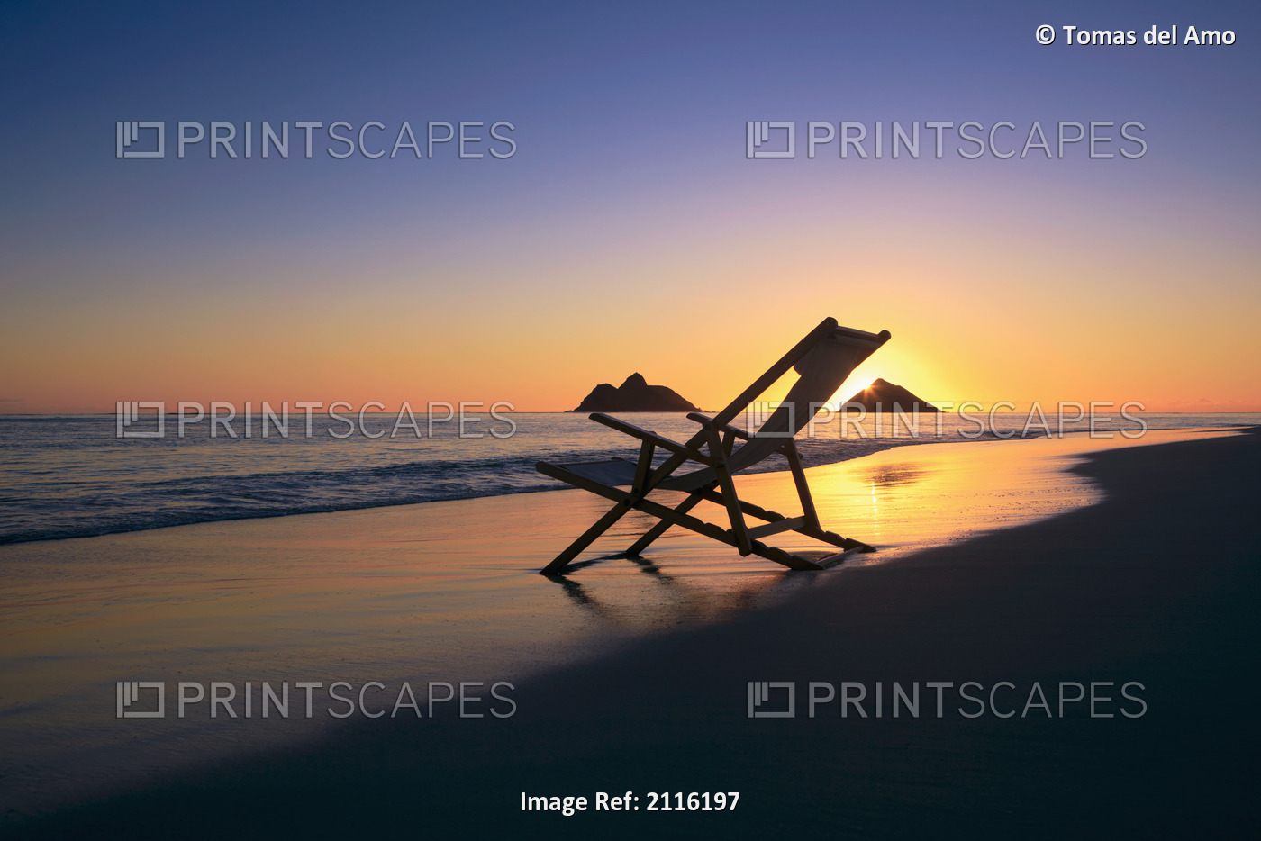 Hawaii, Lanikai, Empty beach chair at sunset.