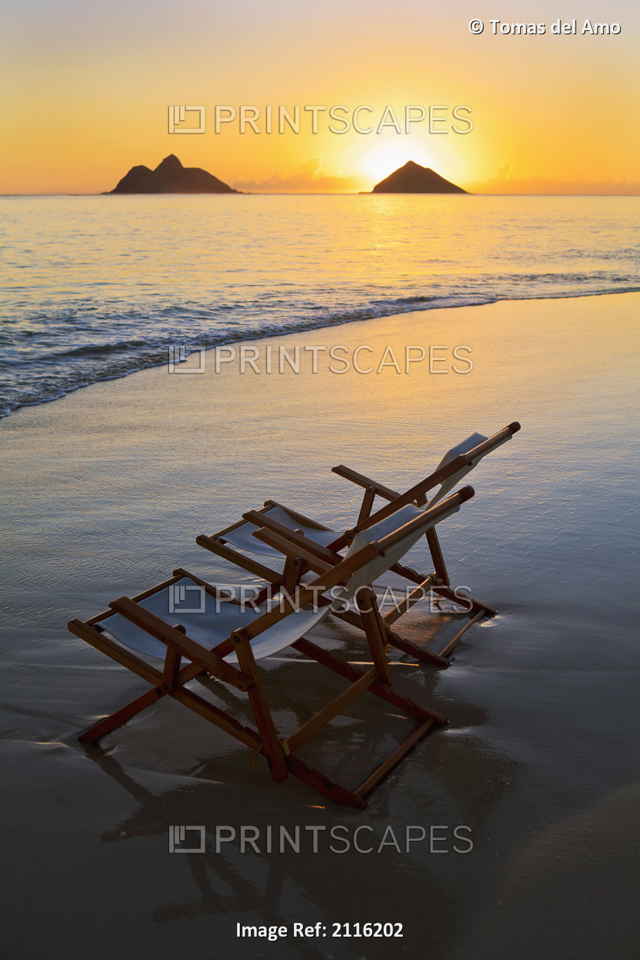 Hawaii, Lanikai, Empty beach chair at sunset.