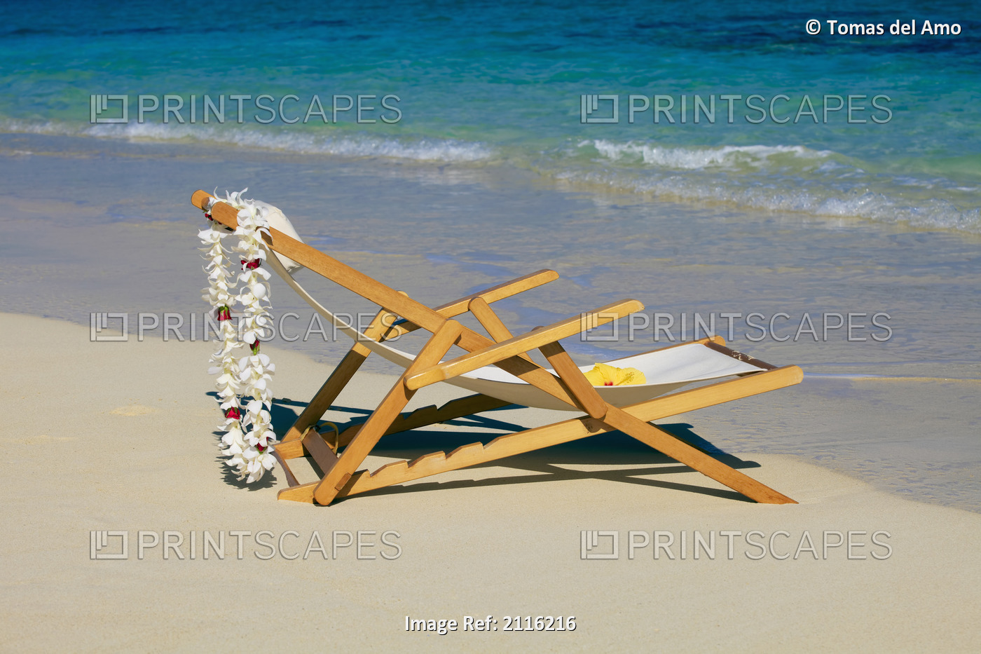 Hawaii, Oahu, Kailua, A lounge chair on the white sandy beach of Lanikai.