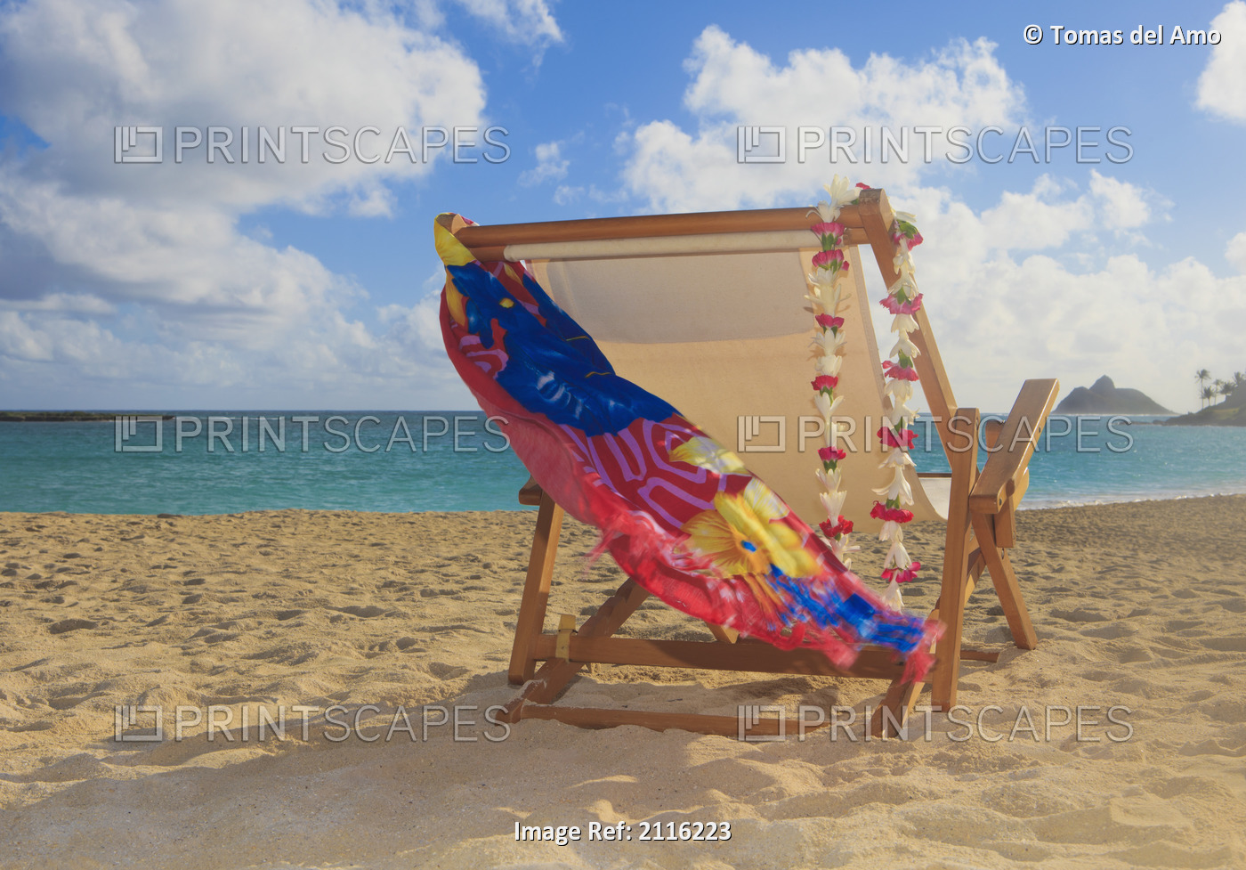 Hawaii, Oahu, Kailua, A lounge chair on the white sandy beach of Lanikai.