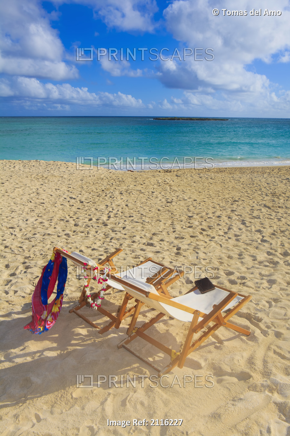 Hawaii, Oahu, Kailua, Two lounge chairs on the white sandy beach of Lanikai.