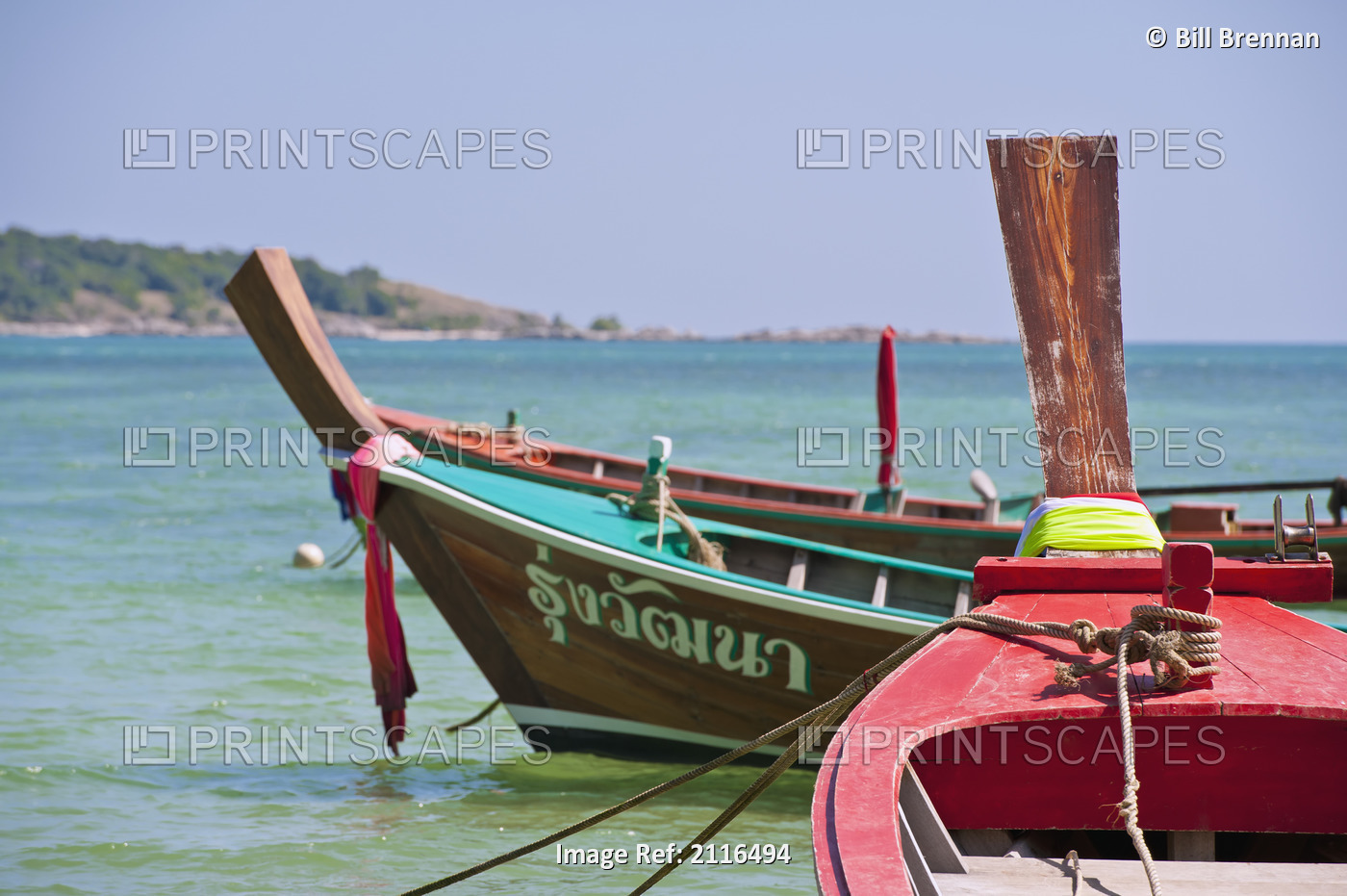 Thailand, Phuket, Rawaii Beach, Close up of longtail boats along the shoreline, ...