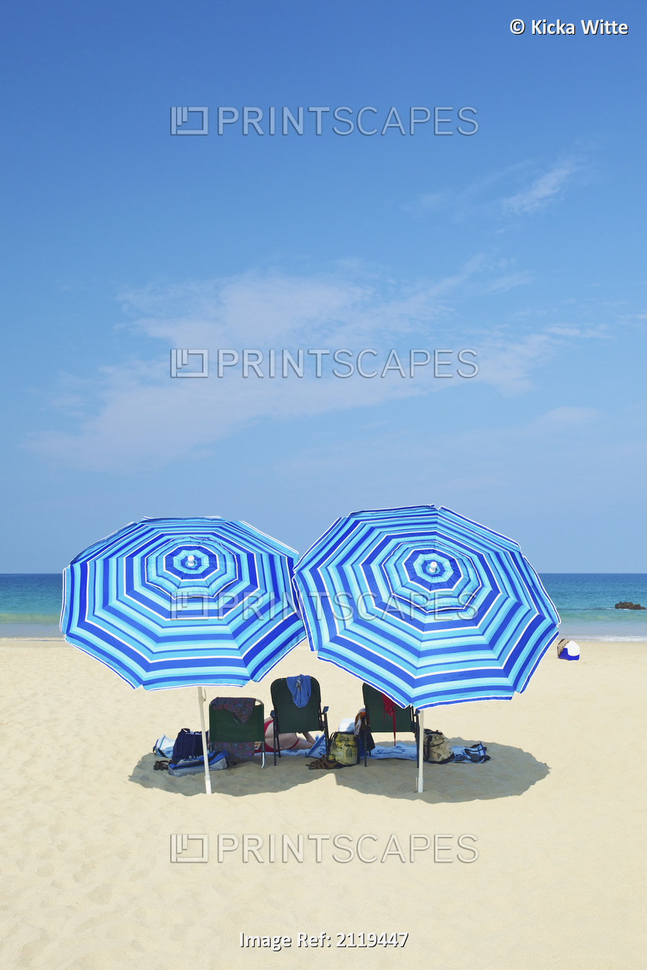 Beach Chairs And Blue Umbrellas On The Beach; Wailua, Hawaii, United States Of ...