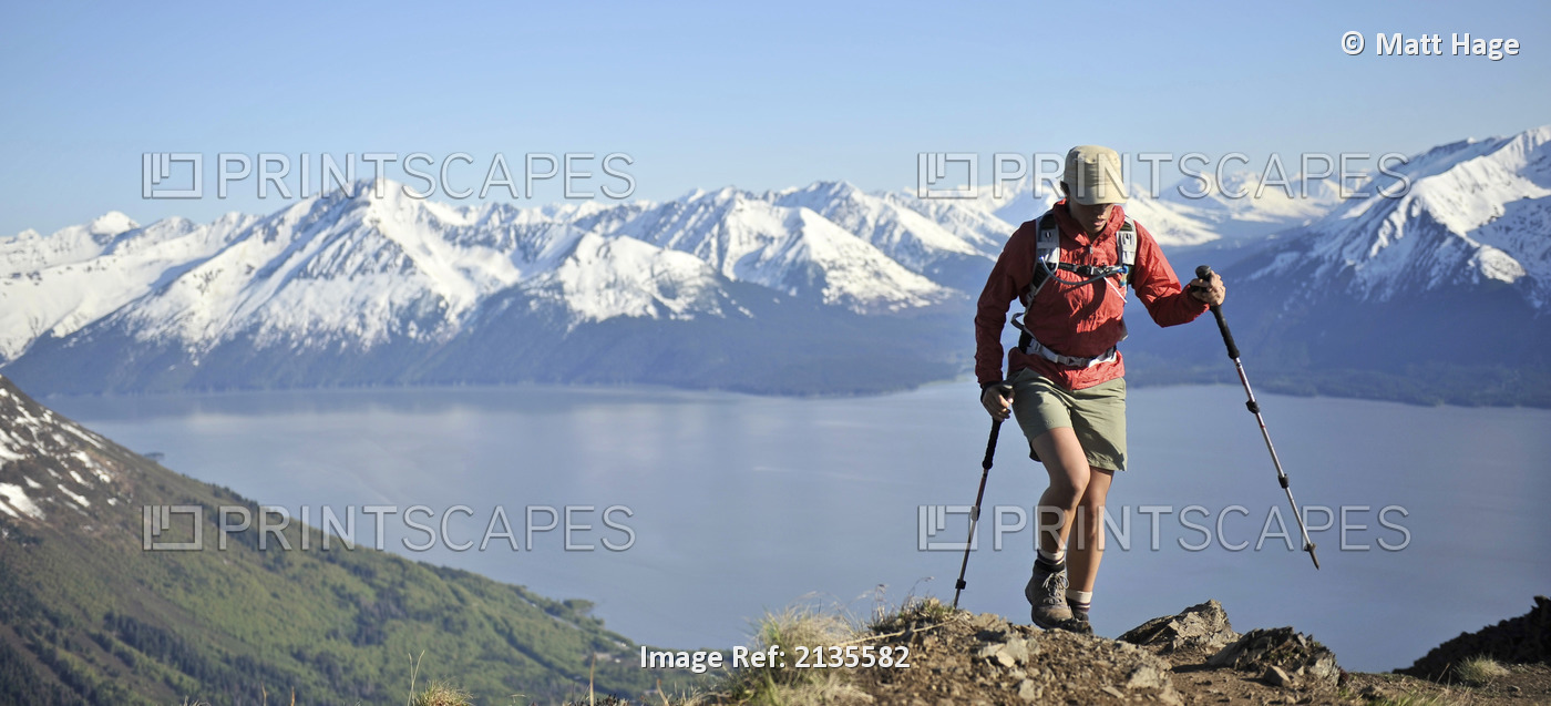 Woman Hikes Up The Bird Ridge Trail In Chugach State Park With The Scenic Kenai ...