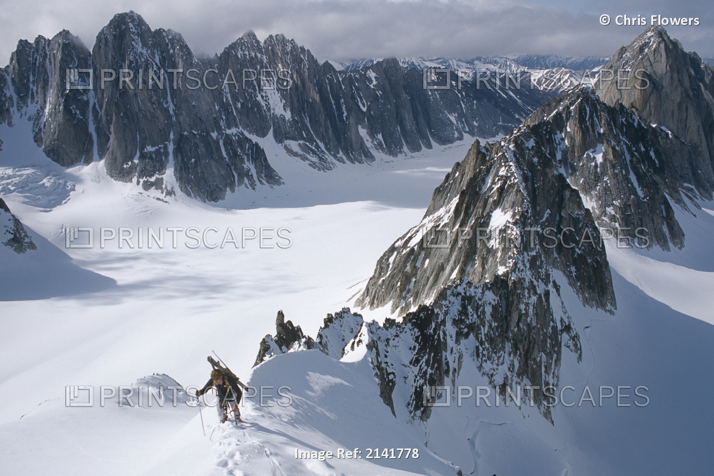 Mountaineer Climbing On Narrow Ridge In Kichatna Mtns Denali National Park ...